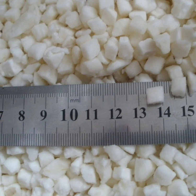 Diced water chestnut ruler reference Company reference photo of diced water chestnut with a ruler for scale