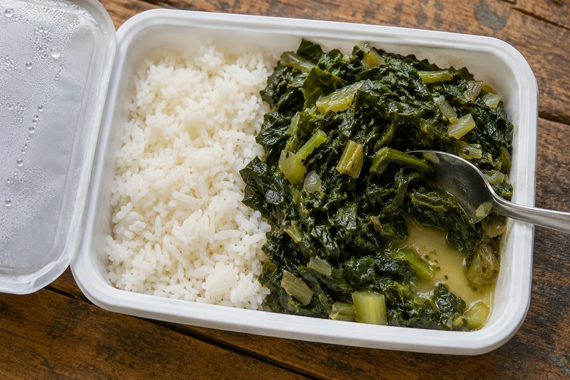 Cooked mallow leaf pieces in a reheated rice meal