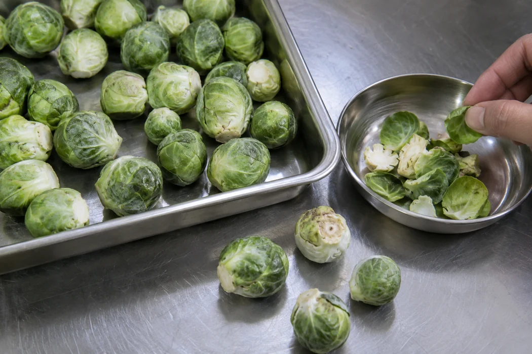 Separating loose Brussels sprout leaves Separating loose Brussels sprout leaves