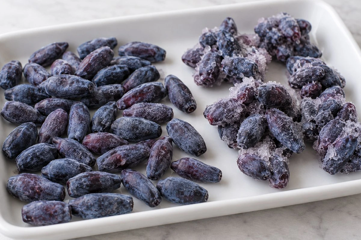 Haskap frozen clumps and frost Haskap frozen clumps and frost in an illustrative food preparation scene