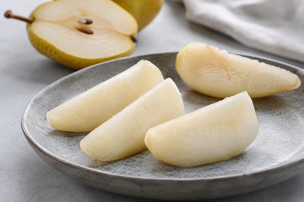 Maturity and texture - Pear ingredients Peeled pear wedges illustrate a range of cut-surface appearance; firmness requires an agreed test