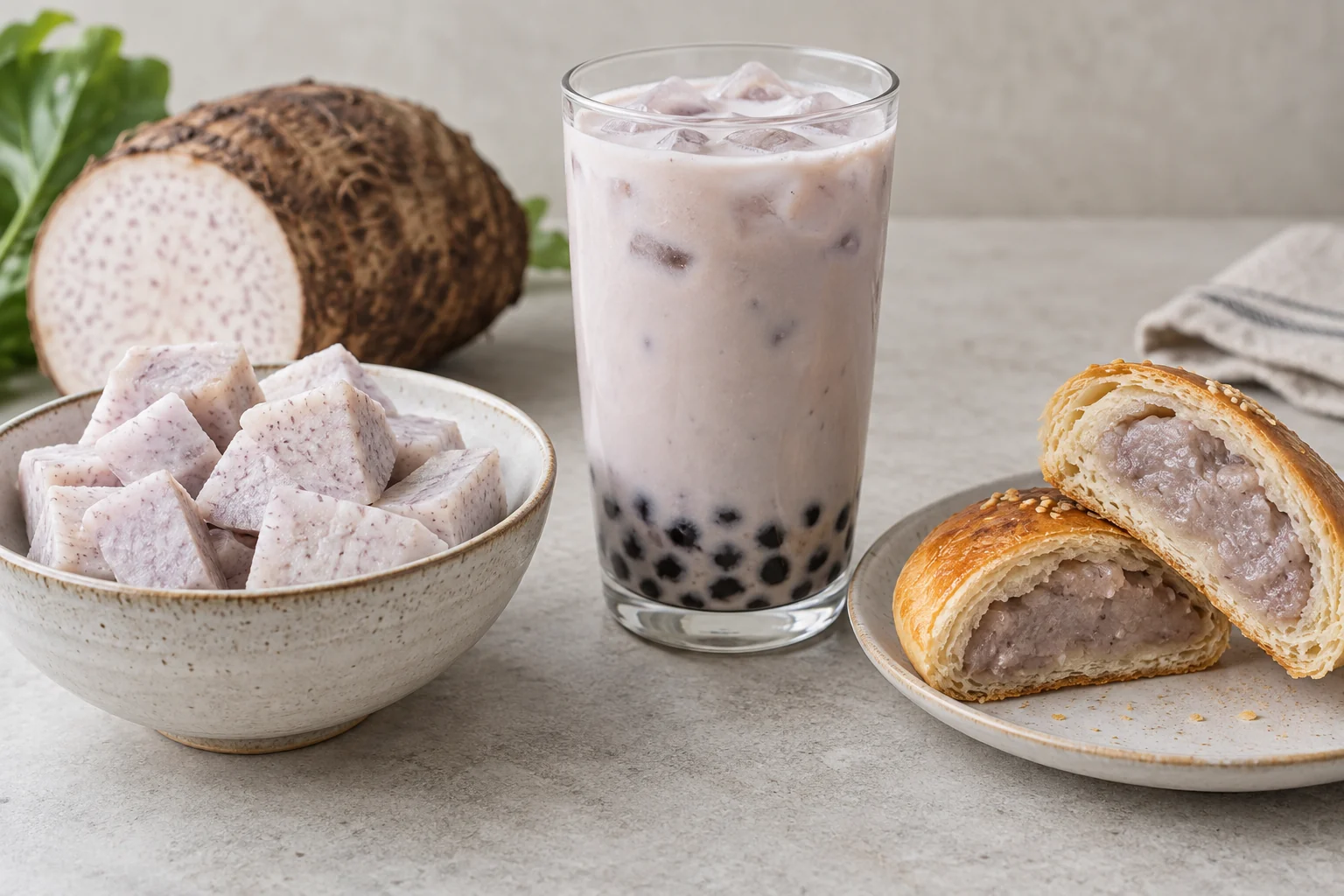 Plain taro beside a taro beverage and a filled pastry