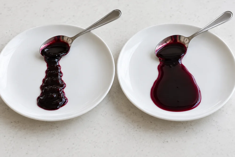 Two mulberry syrup trails showing different spreading behavior