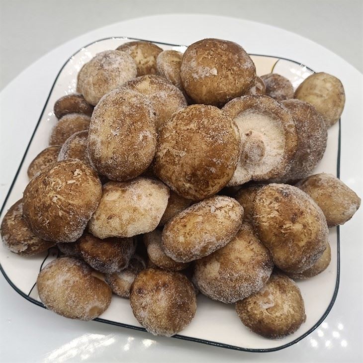 Real GreenLand photograph of frozen whole shiitake caps