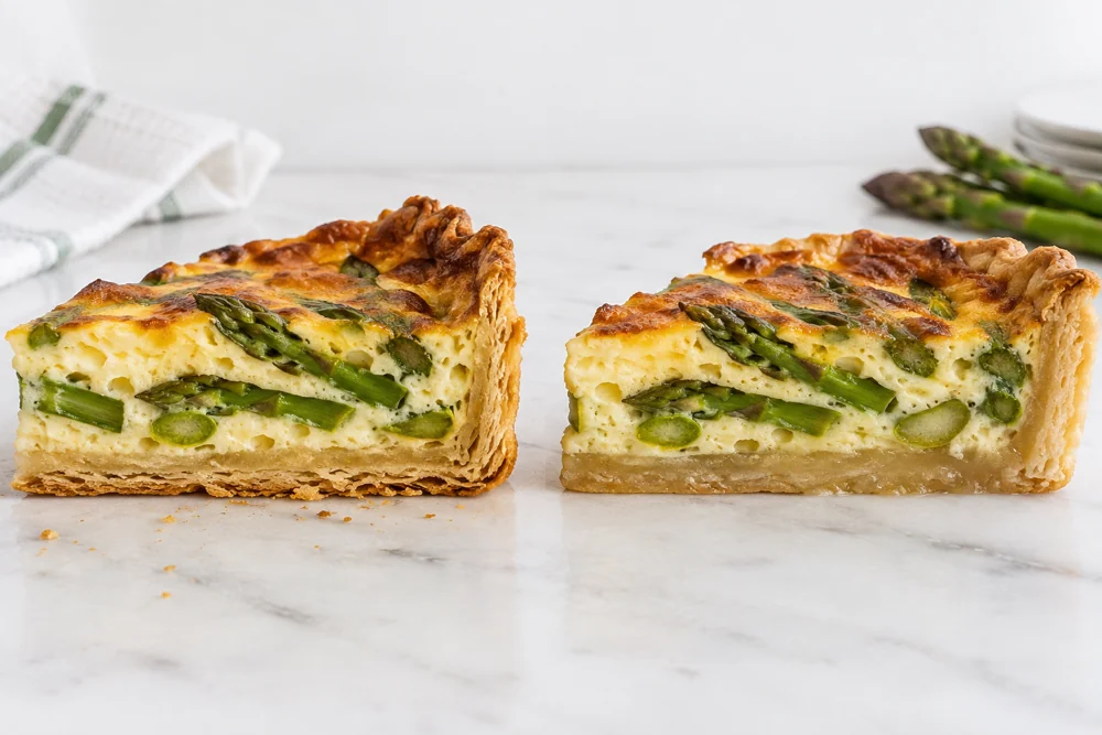 Inspect the pastry beneath the slice for a visible damp band