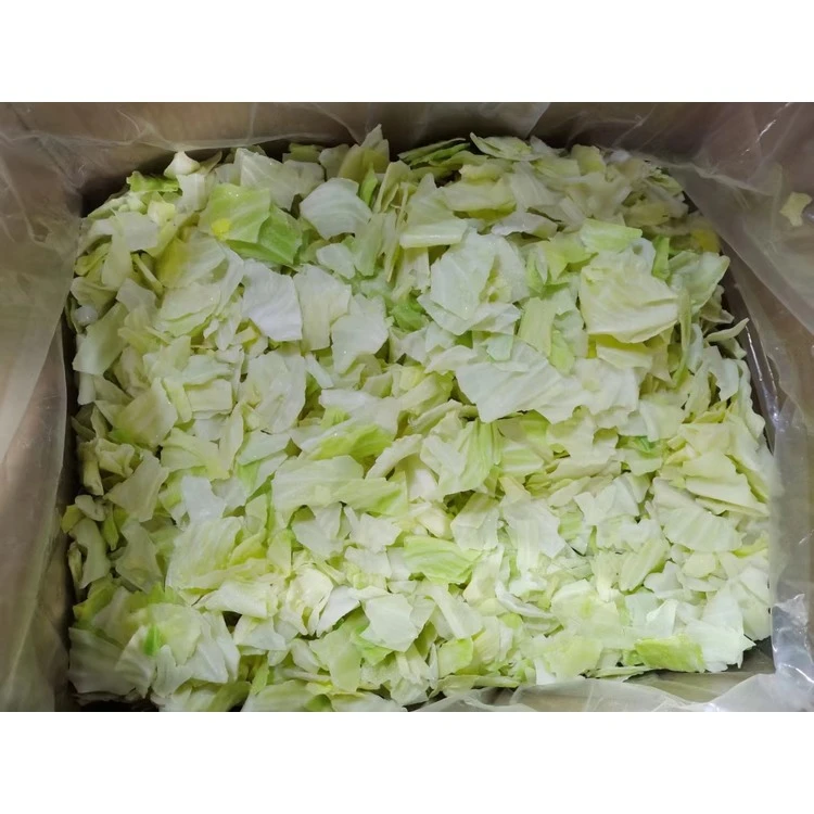 Bulk cut cabbage pieces in a carton