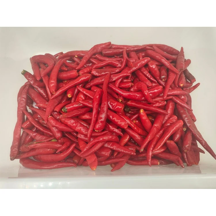 Whole red chilli peppers in a product tray