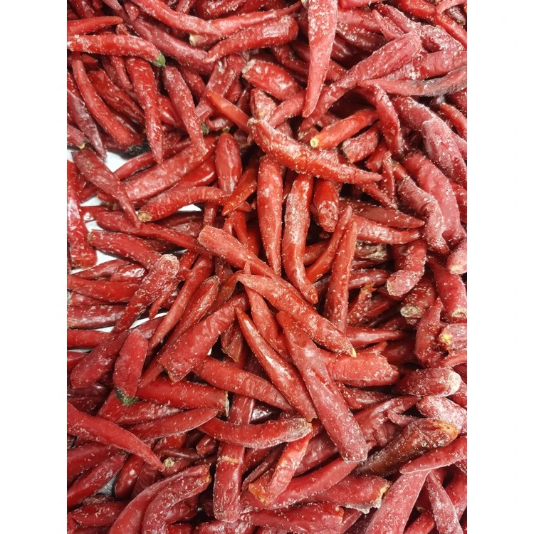 Loose red chilli peppers in a bulk product sample
